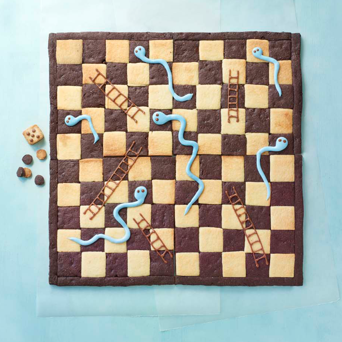 Sophie's Snakes & Ladders Biscuit Board Game - The Great British Bake Off |  The Great British Bake Off