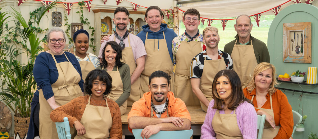 The twelve GBBO bakers from series 15 pose as a group inside the tent