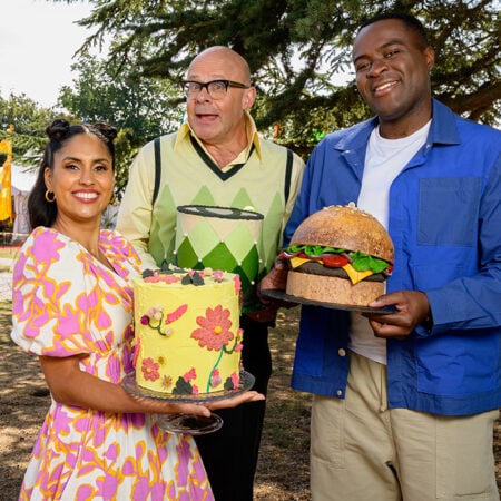 Liam, Rav and Harry stand in front of the Junior Bake Off Tent