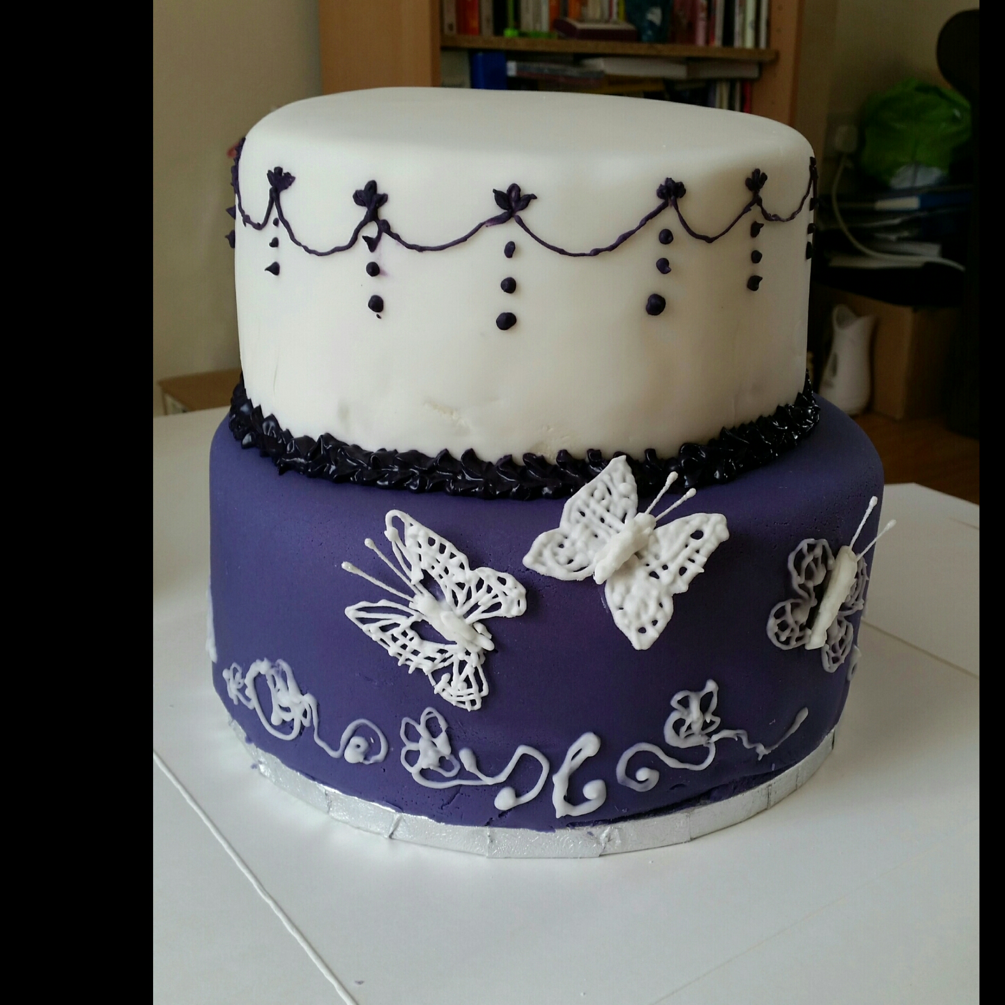 Purple cake with sugar butterfly | The Great British Bake Off